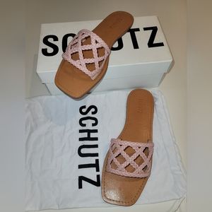 Schutz leather pink braided sandals.